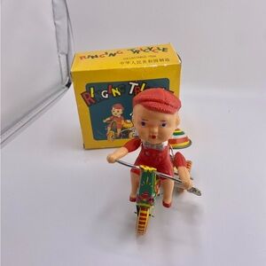 Vintage wind up tricycle toy